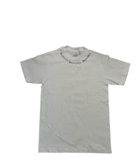 a white t - shirt with writing on it